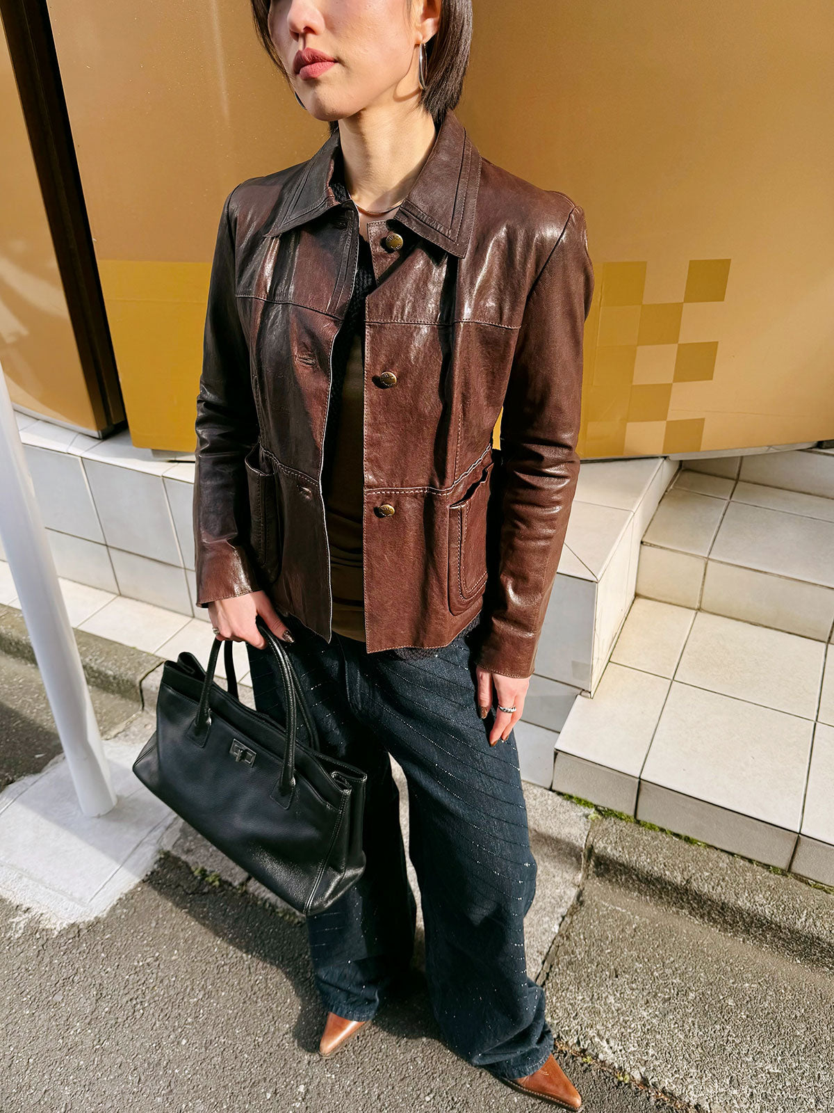 Leather logo button jacket in dark brown