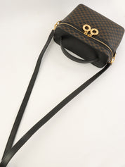 棕色/黑色 Macadam 图案圆形 Logo 两用化妆包