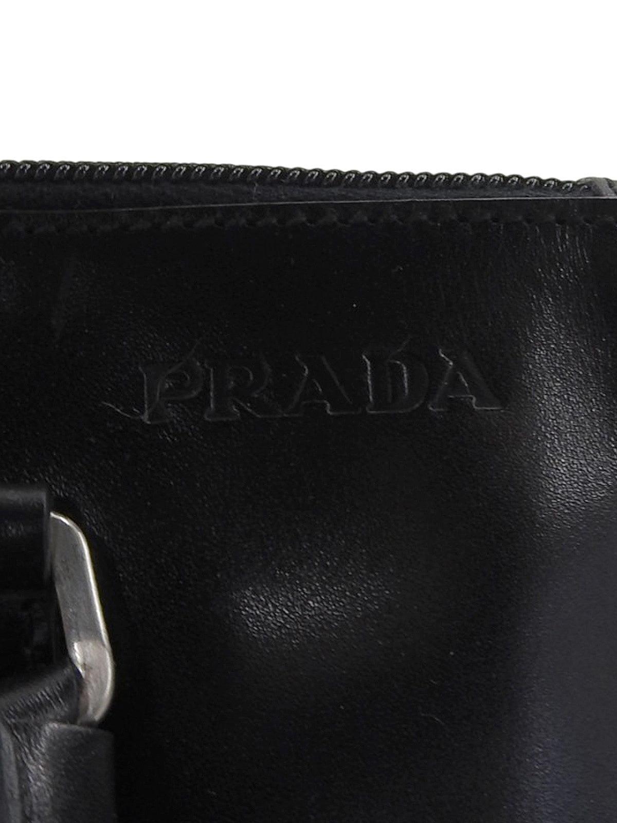 Logo embossed handbag in black