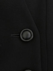 Double-breasted collarless set in black