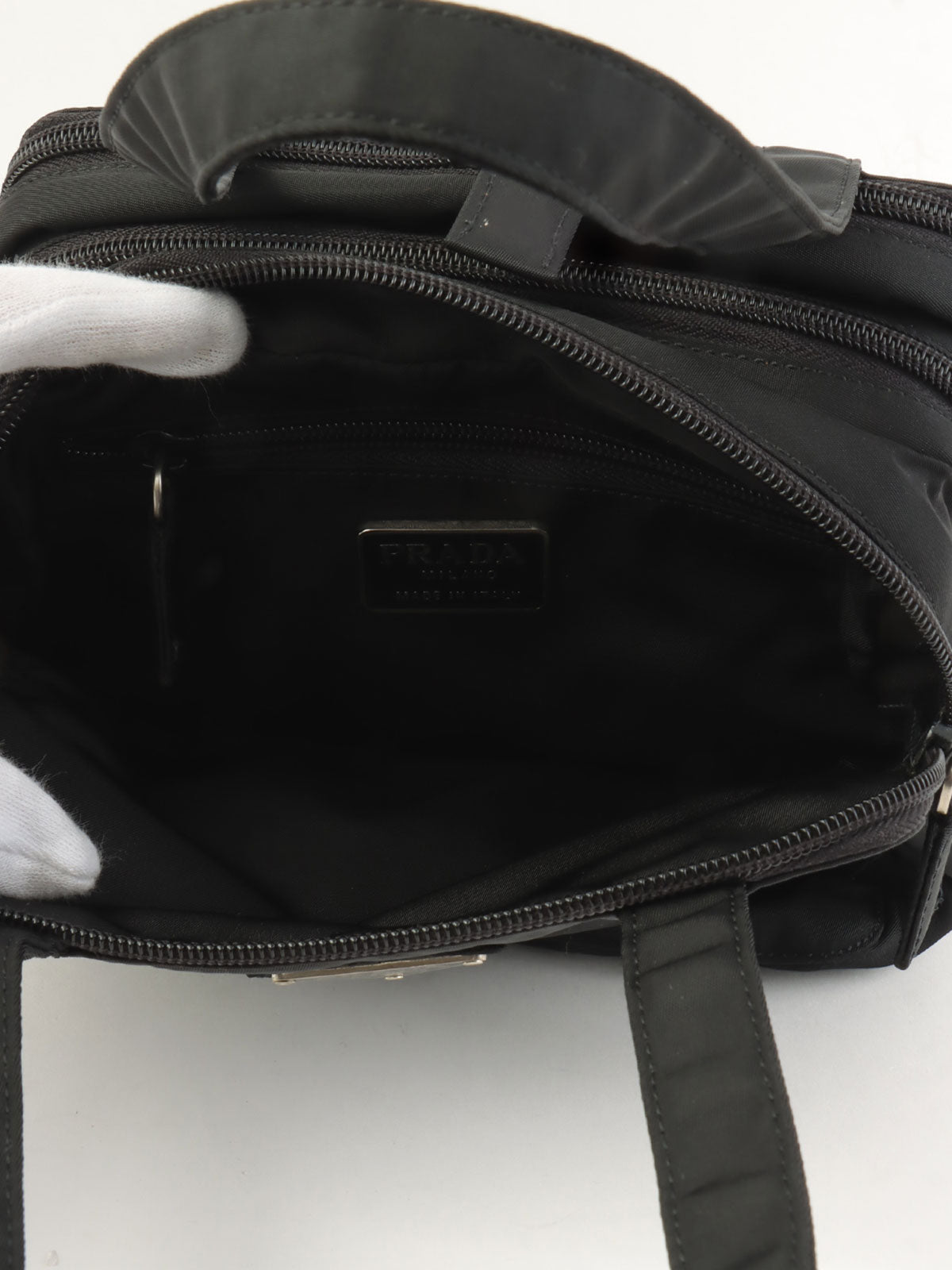 Nylon logo plate mini handbag in black