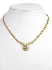 Rhinestone design motif logo necklace, gold