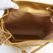 Circa 1992 Circle CC Turn-lock Backpack, Gold