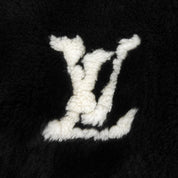 ヌートリアファーロゴリブニットベスト #M ブラック