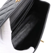 Circa 1997 Caviar Skin CC Turnlock Handbag, Black