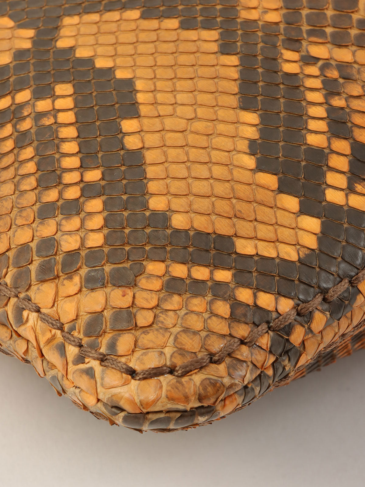 Python logo plate clutch bag in orange