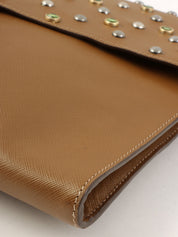 Studded Rhinestone Logo Plate Clutch Bag in Ocher