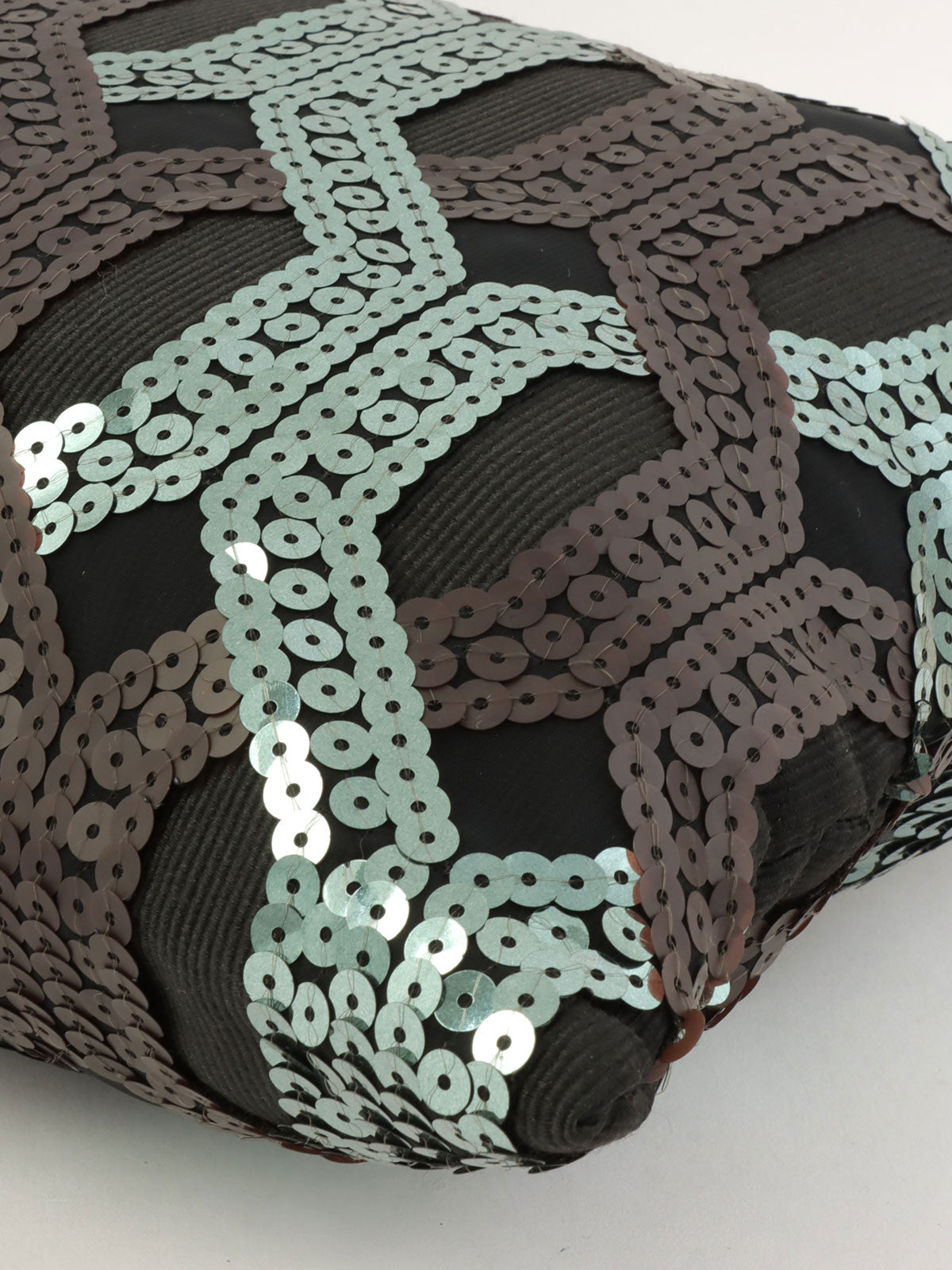 Sequined clutch bag in black/dark green