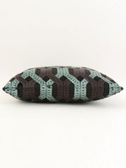 Sequined clutch bag in black/dark green