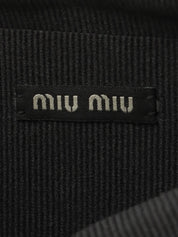 Sequined clutch bag in black/dark green