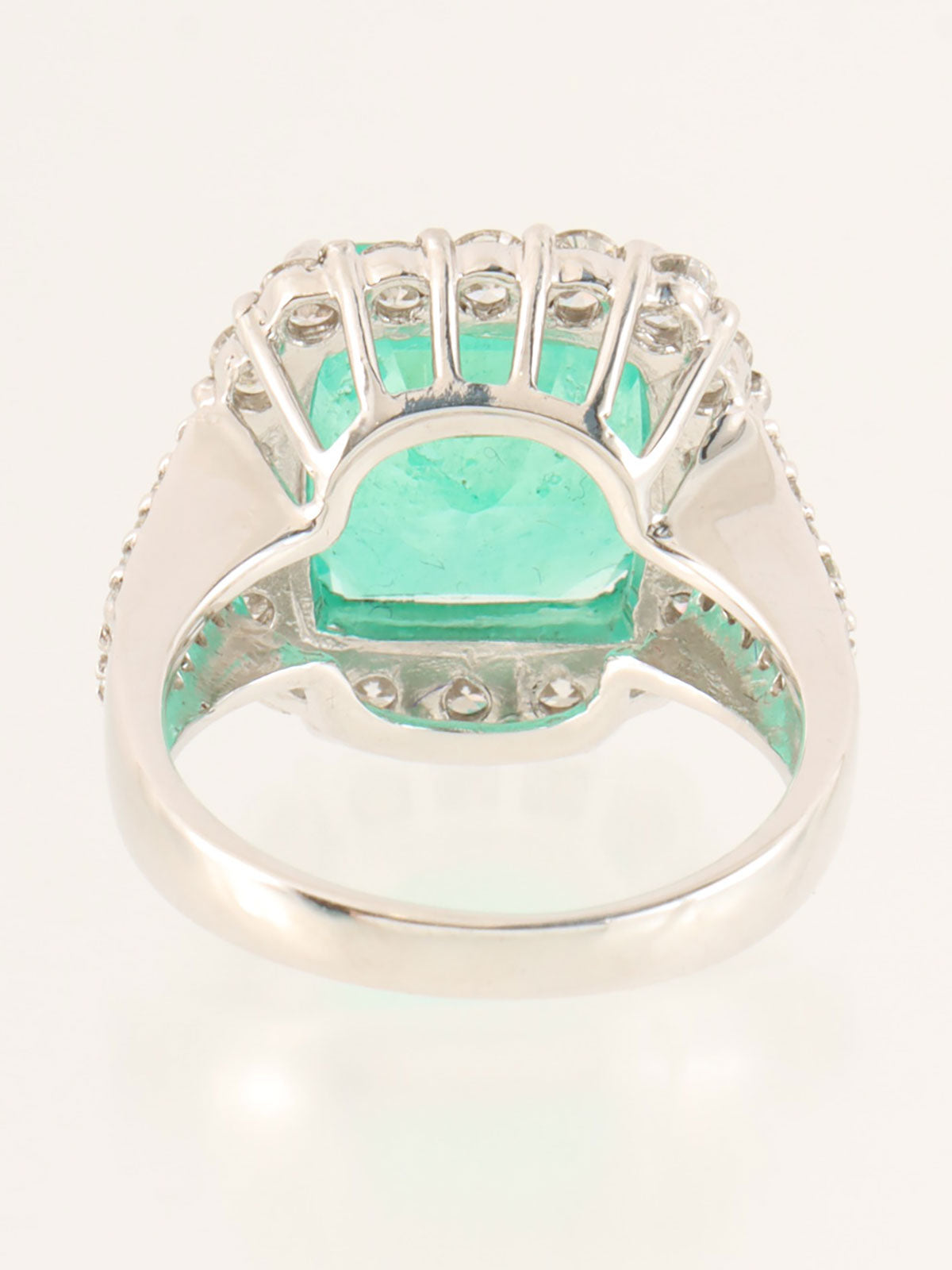 Platinum emerald and diamond square design ring in silver/green