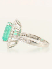 Platinum emerald and diamond square ring in silver/green