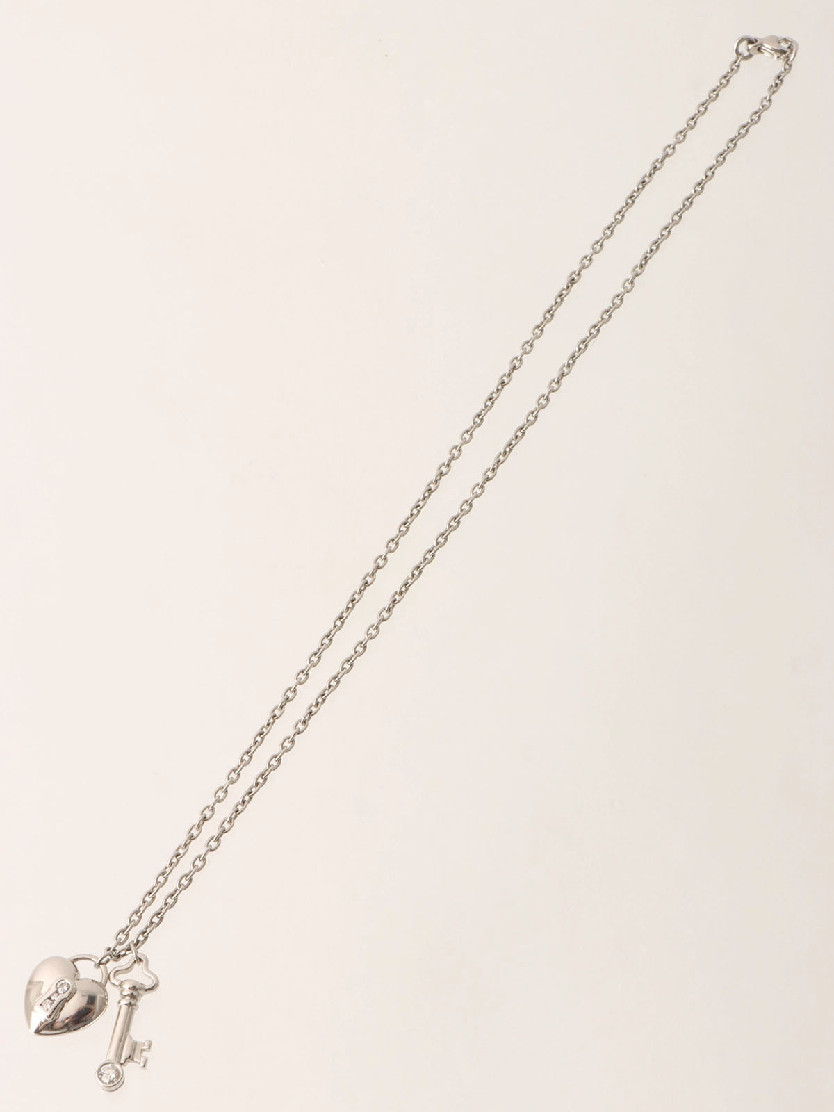 Platinum Diamond Heart Lock Key Necklace in Silver