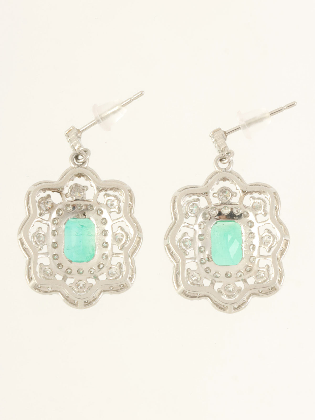 Platinum emerald and diamond design earrings in silver/green