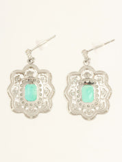 Platinum emerald and diamond design earrings in silver/green