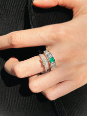 Platinum emerald and diamond ring in silver/green