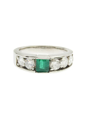 Platinum emerald and diamond ring in silver/green