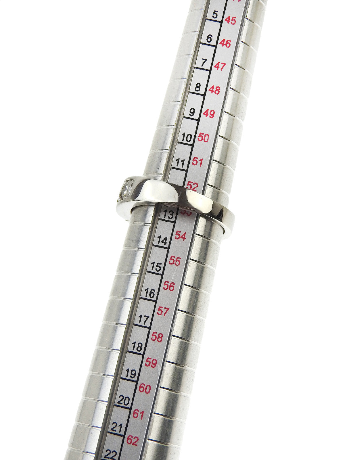 Platinum emerald and diamond ring in silver/green