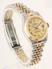 1998-1999 年蚝式恒动日历型腕表，银/金/贝壳黄