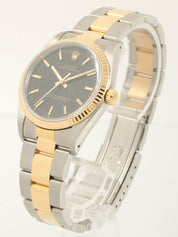 约1991年蚝式恒动银/金/黑腕表