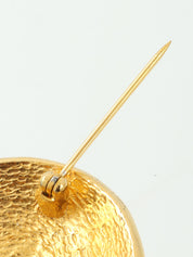 Round logo design brooch in gold