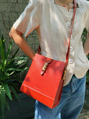 Velázquez shoulder bag in coral red